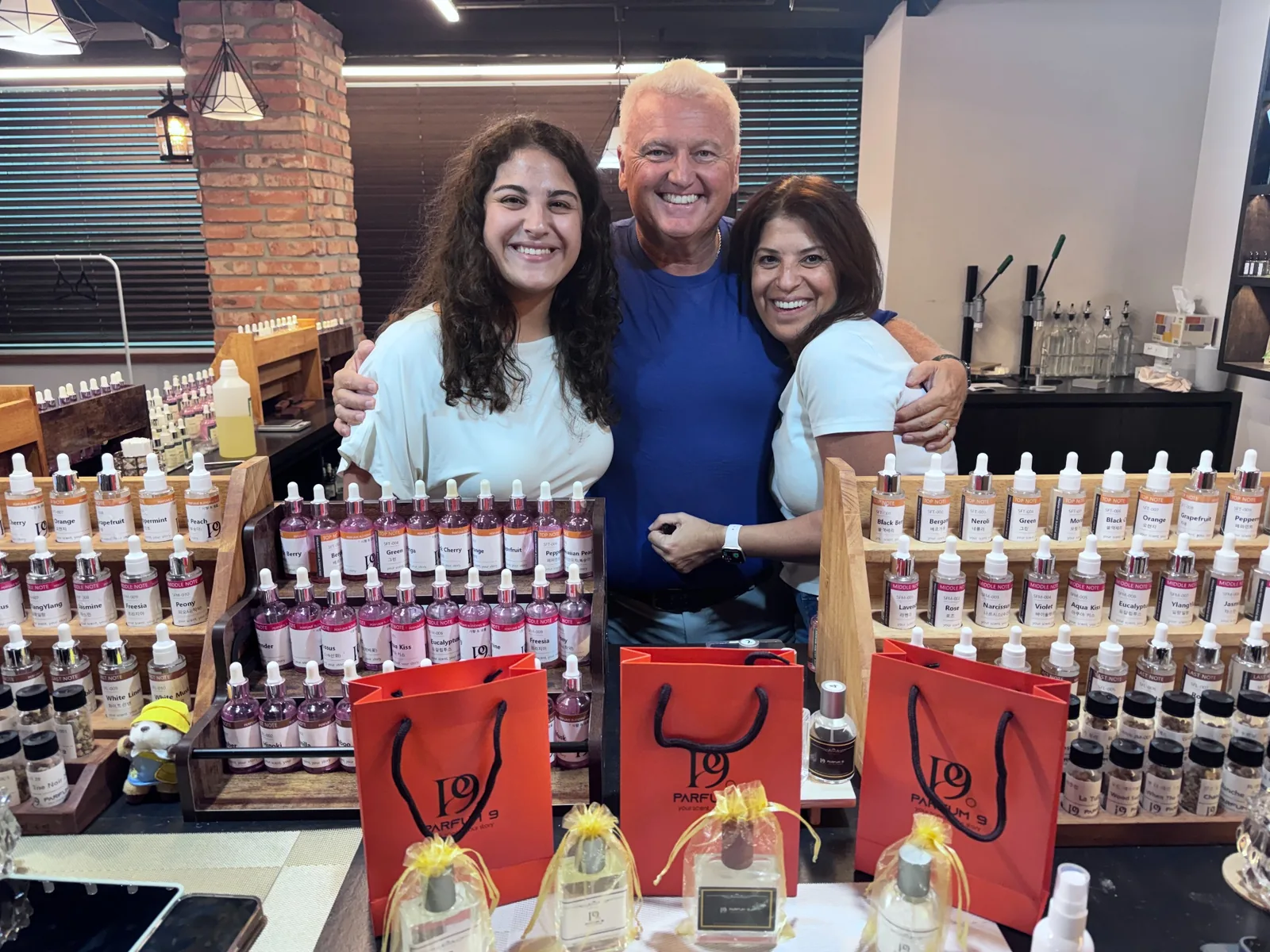 Family enjoying a perfume making experience at Parfum9 in Hongdae Seoul
