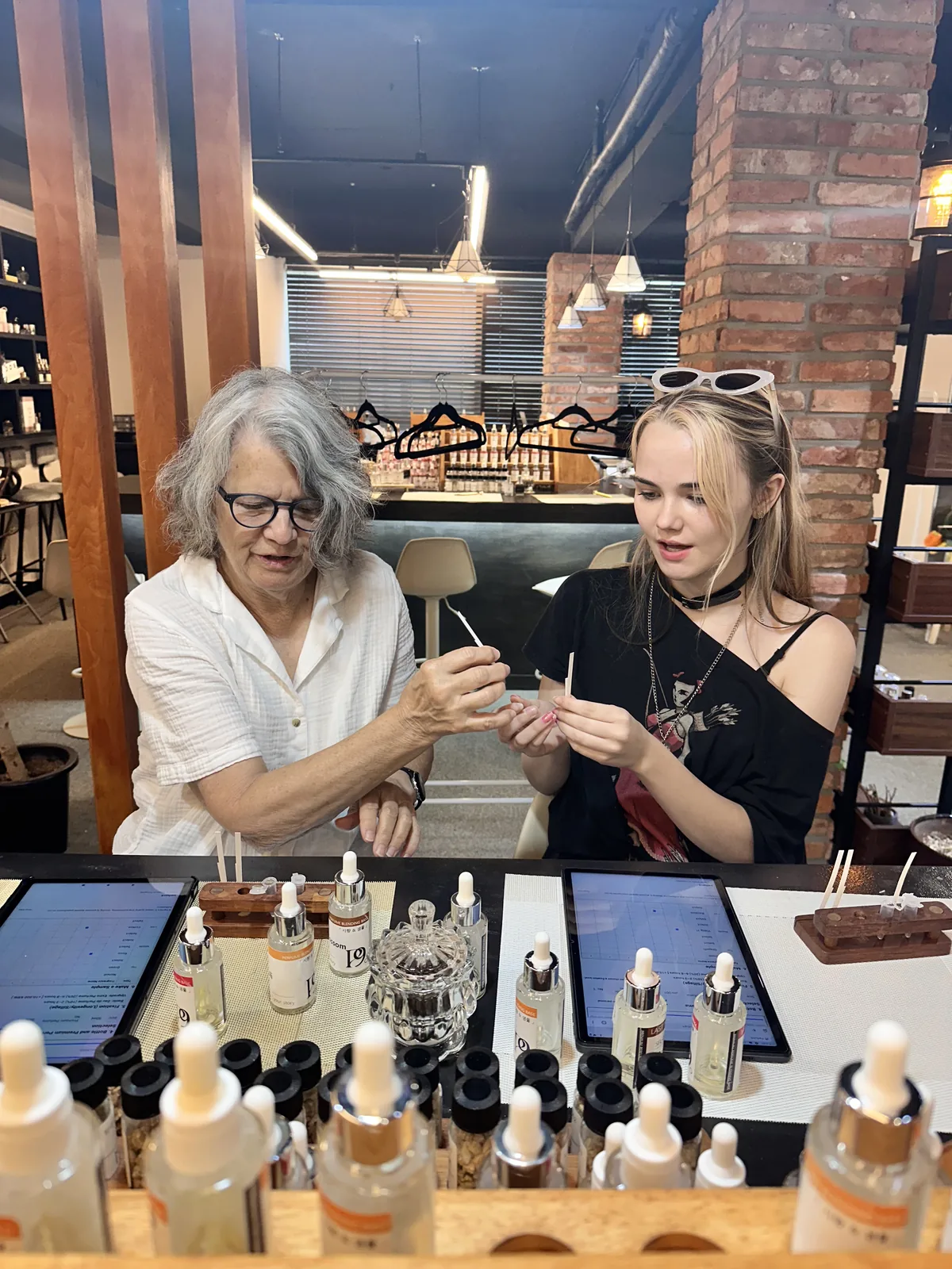 Family enjoying a perfume making workshop together in Hongdae Seoul